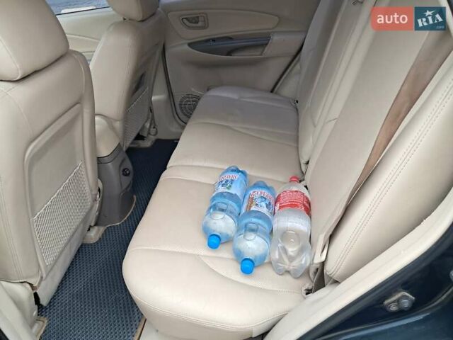 Зеленый Хендай Туксон, объемом двигателя 1.98 л и пробегом 280 тыс. км за 7200 $, фото 28 на Automoto.ua