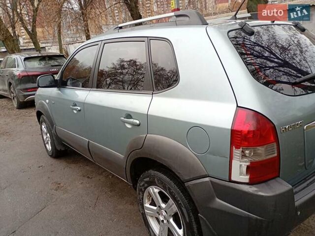 Зелений Хендай Туксон, об'ємом двигуна 1.99 л та пробігом 218 тис. км за 6500 $, фото 9 на Automoto.ua
