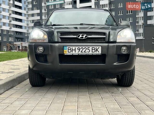 Зеленый Хендай Туксон, объемом двигателя 2 л и пробегом 82 тыс. км за 9950 $, фото 5 на Automoto.ua