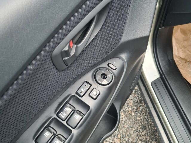 Зелений Хендай Туксон, об'ємом двигуна 2 л та пробігом 149 тис. км за 9900 $, фото 10 на Automoto.ua