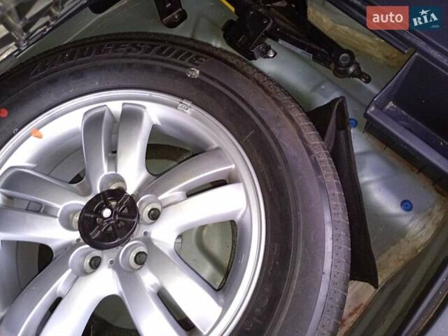 Зелений Хендай Туксон, об'ємом двигуна 1.99 л та пробігом 218 тис. км за 6500 $, фото 2 на Automoto.ua