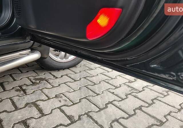 Зелений Хендай Туксон, об'ємом двигуна 1.98 л та пробігом 245 тис. км за 7800 $, фото 20 на Automoto.ua