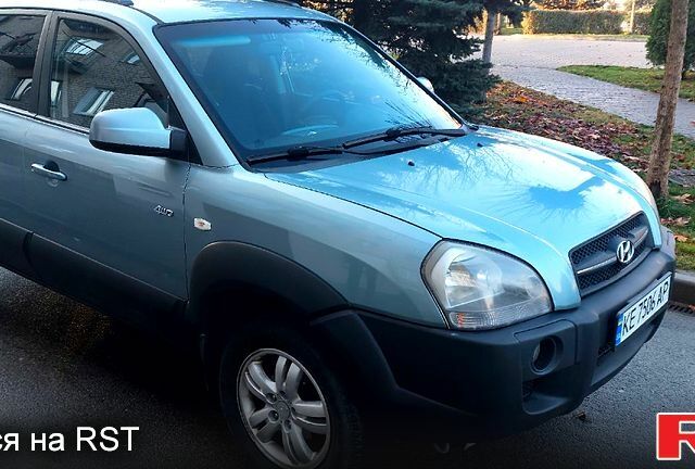 Зелений Хендай Туксон, об'ємом двигуна 2 л та пробігом 227 тис. км за 7800 $, фото 6 на Automoto.ua