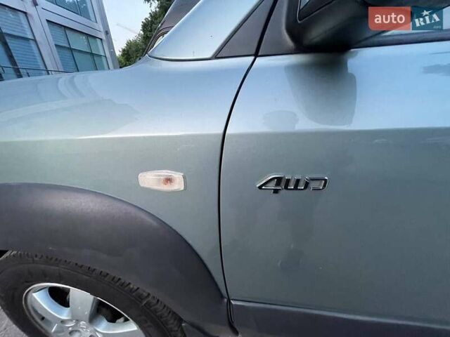 Зеленый Хендай Туксон, объемом двигателя 1.98 л и пробегом 205 тыс. км за 7700 $, фото 22 на Automoto.ua