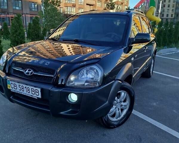 Зелений Хендай Туксон, об'ємом двигуна 1.98 л та пробігом 185 тис. км за 8100 $, фото 5 на Automoto.ua