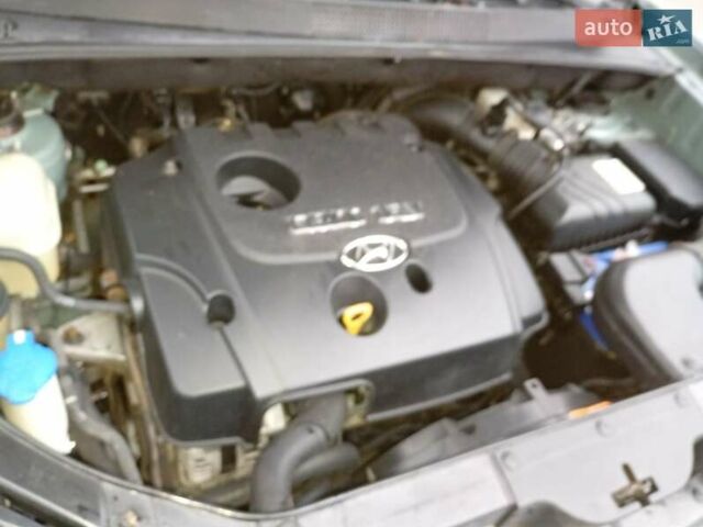 Зелений Хендай Туксон, об'ємом двигуна 1.99 л та пробігом 218 тис. км за 6500 $, фото 1 на Automoto.ua