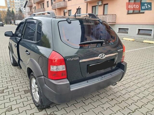 Зеленый Хендай Туксон, объемом двигателя 1.98 л и пробегом 280 тыс. км за 7200 $, фото 4 на Automoto.ua