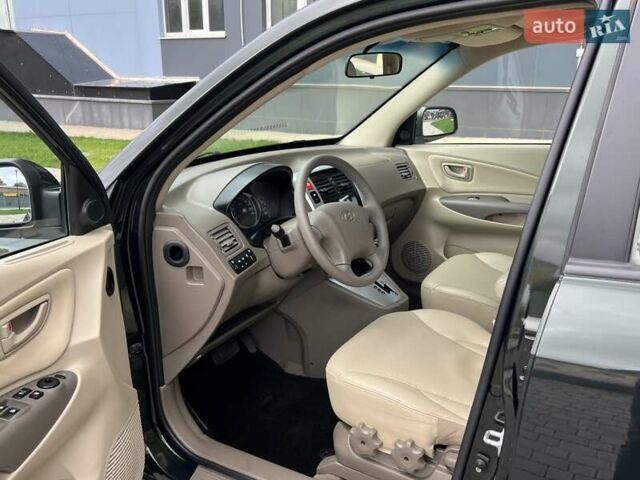 Зеленый Хендай Туксон, объемом двигателя 2 л и пробегом 82 тыс. км за 9950 $, фото 9 на Automoto.ua