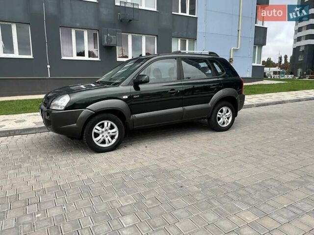 Зеленый Хендай Туксон, объемом двигателя 2 л и пробегом 82 тыс. км за 9950 $, фото 3 на Automoto.ua