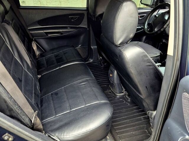 Зелений Хендай Туксон, об'ємом двигуна 2 л та пробігом 276 тис. км за 9000 $, фото 6 на Automoto.ua