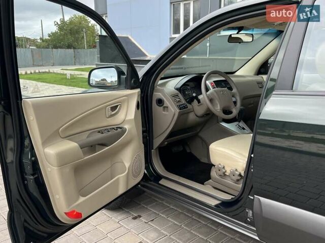 Зеленый Хендай Туксон, объемом двигателя 2 л и пробегом 82 тыс. км за 9950 $, фото 8 на Automoto.ua