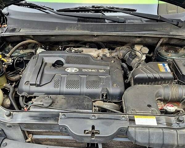 Зелений Хендай Туксон, об'ємом двигуна 2 л та пробігом 276 тис. км за 9000 $, фото 8 на Automoto.ua