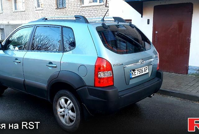 Зелений Хендай Туксон, об'ємом двигуна 2 л та пробігом 227 тис. км за 7800 $, фото 2 на Automoto.ua