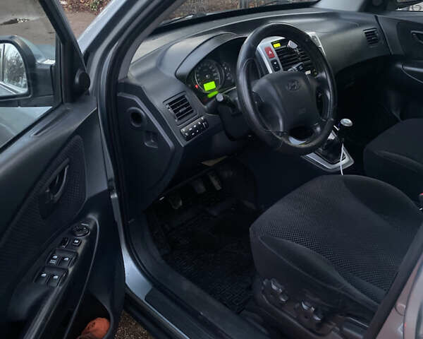 Зеленый Хендай Туксон, объемом двигателя 2 л и пробегом 223 тыс. км за 7950 $, фото 22 на Automoto.ua