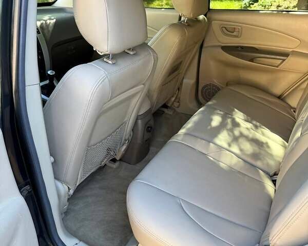 Зелений Хендай Туксон, об'ємом двигуна 1.98 л та пробігом 185 тис. км за 8100 $, фото 30 на Automoto.ua