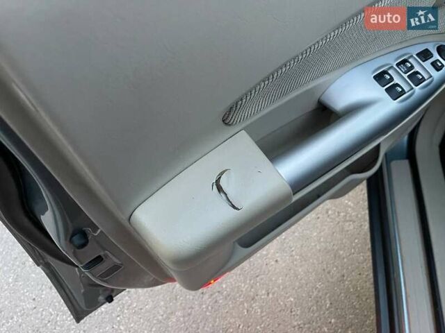 Зеленый Хендай Туксон, объемом двигателя 1.98 л и пробегом 205 тыс. км за 7700 $, фото 33 на Automoto.ua