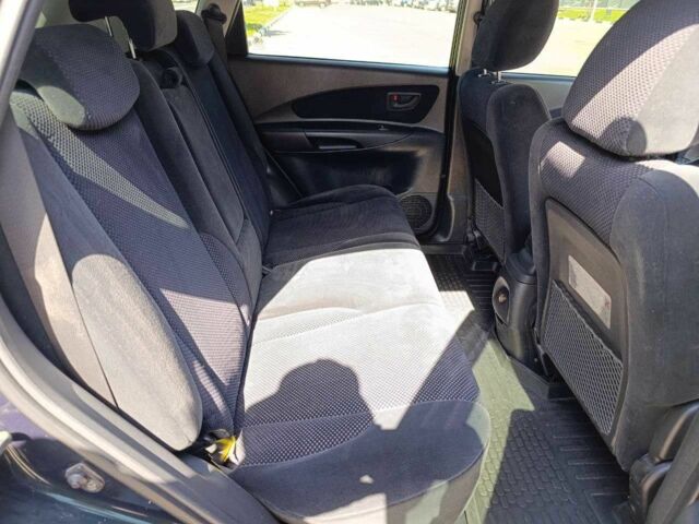 Зелений Хендай Туксон, об'ємом двигуна 2 л та пробігом 203 тис. км за 7200 $, фото 6 на Automoto.ua