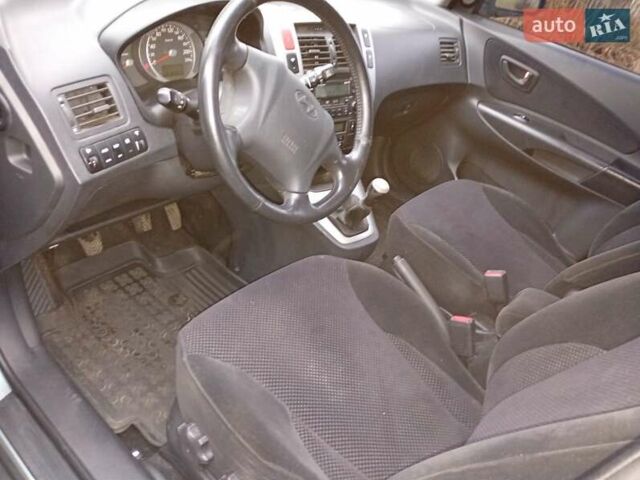 Зелений Хендай Туксон, об'ємом двигуна 1.99 л та пробігом 218 тис. км за 6500 $, фото 3 на Automoto.ua