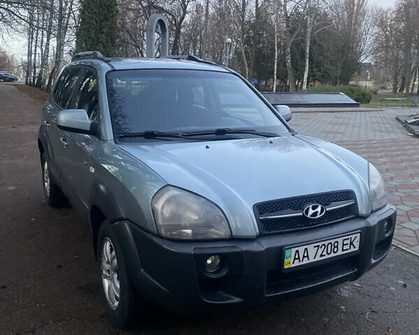 Зеленый Хендай Туксон, объемом двигателя 2 л и пробегом 223 тыс. км за 7950 $, фото 3 на Automoto.ua