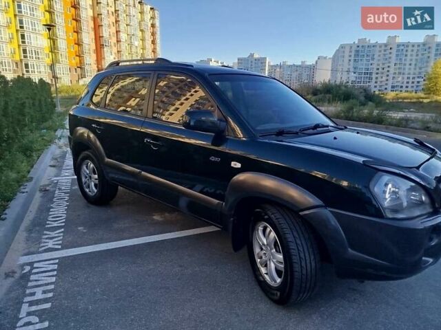 Зелений Хендай Туксон, об'ємом двигуна 1.98 л та пробігом 185 тис. км за 8100 $, фото 16 на Automoto.ua