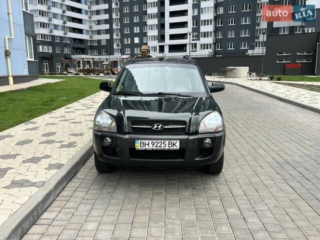 Зеленый Хендай Туксон, объемом двигателя 2 л и пробегом 82 тыс. км за 9950 $, фото 1 на Automoto.ua