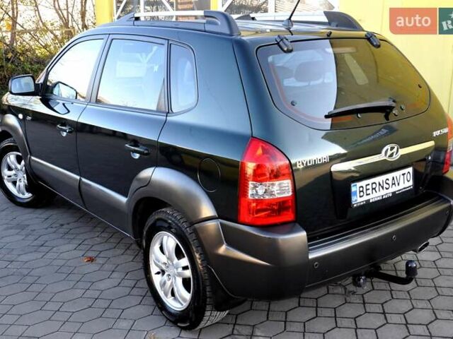 Зеленый Хендай Туксон, объемом двигателя 1.98 л и пробегом 245 тыс. км за 7200 $, фото 41 на Automoto.ua