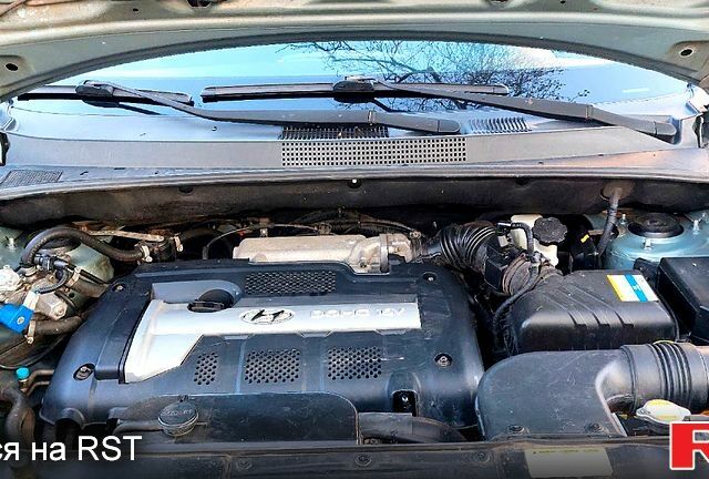 Зелений Хендай Туксон, об'ємом двигуна 2 л та пробігом 227 тис. км за 7800 $, фото 9 на Automoto.ua