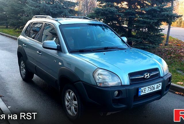 Зелений Хендай Туксон, об'ємом двигуна 2 л та пробігом 227 тис. км за 7800 $, фото 7 на Automoto.ua