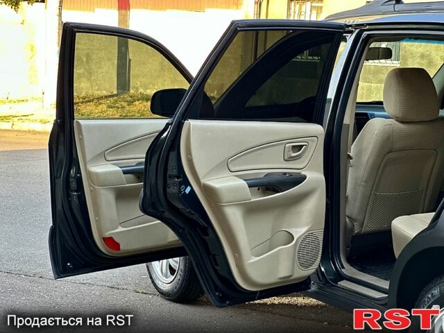 Зеленый Хендай Туксон, объемом двигателя 2 л и пробегом 172 тыс. км за 7000 $, фото 6 на Automoto.ua