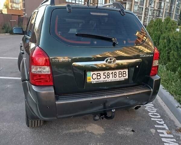 Зелений Хендай Туксон, об'ємом двигуна 1.98 л та пробігом 185 тис. км за 8100 $, фото 6 на Automoto.ua