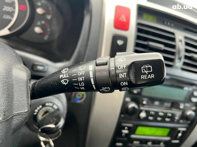 Зеленый Хендай Туксон, объемом двигателя 2 л и пробегом 223 тыс. км за 8540 $, фото 20 на Automoto.ua