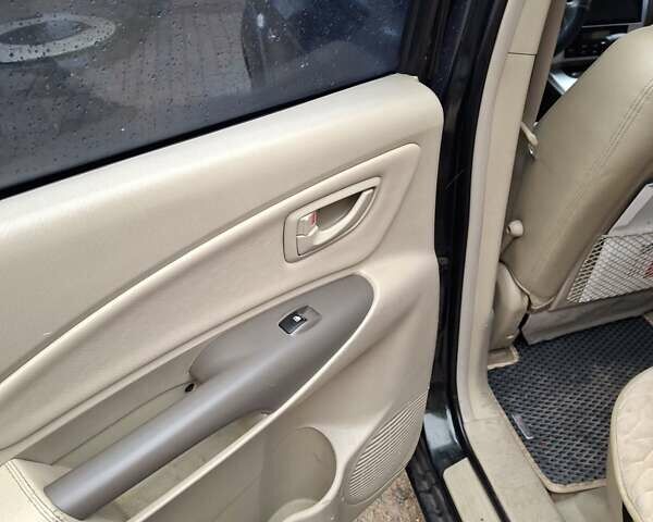 Зелений Хендай Туксон, об'ємом двигуна 1.98 л та пробігом 280 тис. км за 8500 $, фото 12 на Automoto.ua