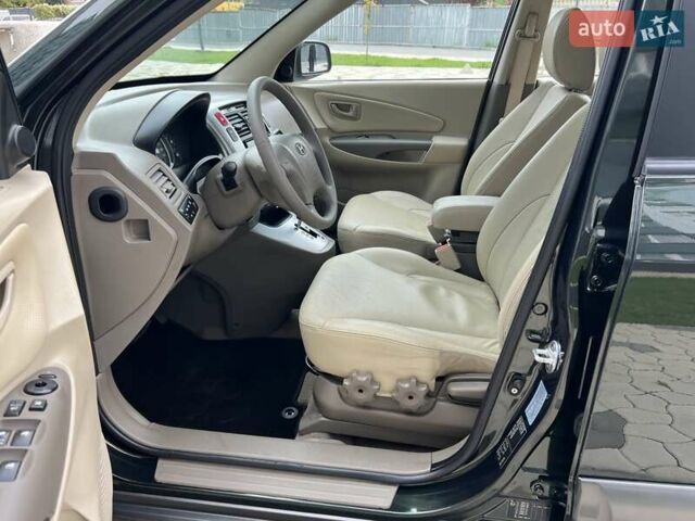Зеленый Хендай Туксон, объемом двигателя 2 л и пробегом 82 тыс. км за 9950 $, фото 59 на Automoto.ua