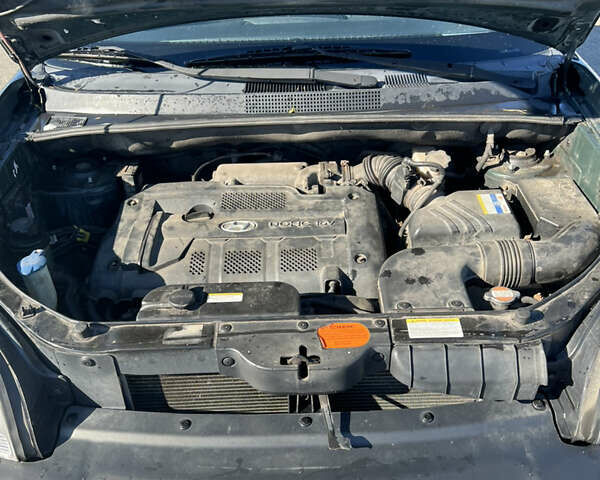Зеленый Хендай Туксон, объемом двигателя 1.98 л и пробегом 292 тыс. км за 7950 $, фото 32 на Automoto.ua