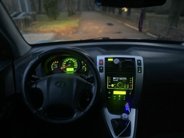 Зеленый Хендай Туксон, объемом двигателя 2 л и пробегом 223 тыс. км за 7950 $, фото 5 на Automoto.ua