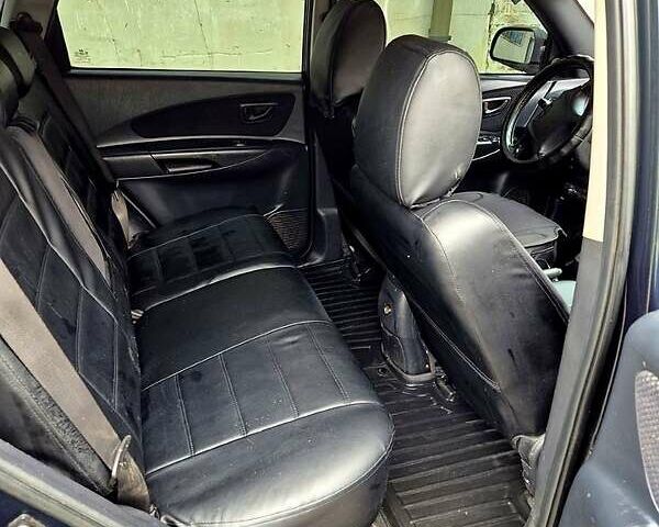 Зелений Хендай Туксон, об'ємом двигуна 2 л та пробігом 276 тис. км за 9000 $, фото 5 на Automoto.ua