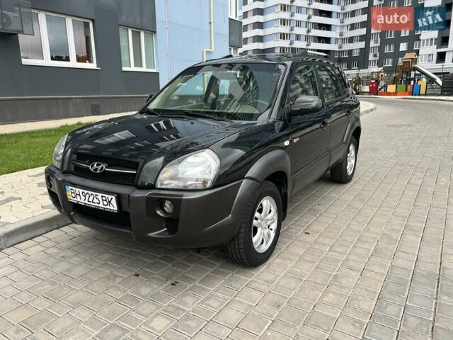 Зеленый Хендай Туксон, объемом двигателя 2 л и пробегом 82 тыс. км за 9950 $, фото 10 на Automoto.ua