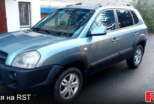 Зелений Хендай Туксон, об'ємом двигуна 2 л та пробігом 227 тис. км за 7800 $, фото 1 на Automoto.ua