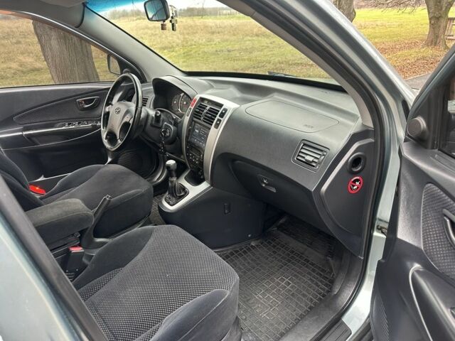 Зеленый Хендай Туксон, объемом двигателя 2 л и пробегом 190 тыс. км за 6150 $, фото 19 на Automoto.ua