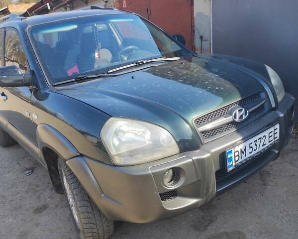 Зелений Хендай Туксон, об'ємом двигуна 1.98 л та пробігом 189 тис. км за 8500 $, фото 4 на Automoto.ua