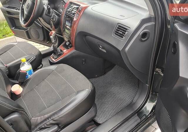 Зелений Хендай Туксон, об'ємом двигуна 1.98 л та пробігом 245 тис. км за 7800 $, фото 22 на Automoto.ua