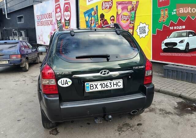 Зелений Хендай Туксон, об'ємом двигуна 1.98 л та пробігом 245 тис. км за 7800 $, фото 3 на Automoto.ua