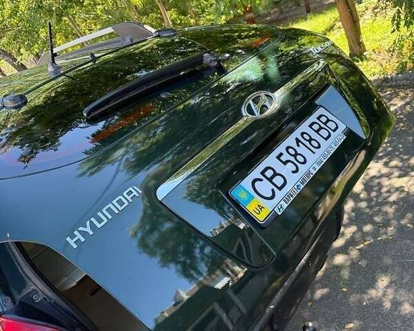 Зелений Хендай Туксон, об'ємом двигуна 1.98 л та пробігом 185 тис. км за 8100 $, фото 23 на Automoto.ua