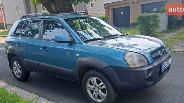 Зеленый Хендай Туксон, объемом двигателя 2 л и пробегом 250 тыс. км за 4000 $, фото 4 на Automoto.ua