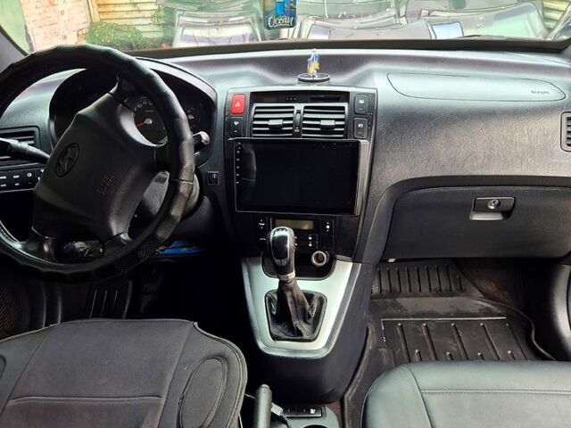 Зелений Хендай Туксон, об'ємом двигуна 2 л та пробігом 276 тис. км за 9000 $, фото 7 на Automoto.ua