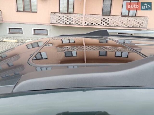 Зеленый Хендай Туксон, объемом двигателя 1.98 л и пробегом 280 тыс. км за 7200 $, фото 14 на Automoto.ua