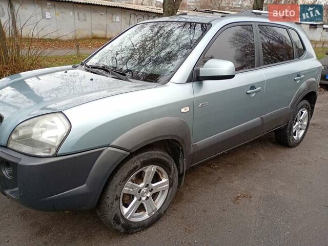 Зелений Хендай Туксон, об'ємом двигуна 1.99 л та пробігом 218 тис. км за 6500 $, фото 7 на Automoto.ua