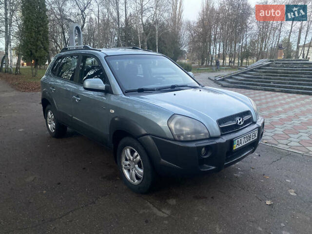 Зеленый Хендай Туксон, объемом двигателя 2 л и пробегом 223 тыс. км за 7950 $, фото 4 на Automoto.ua