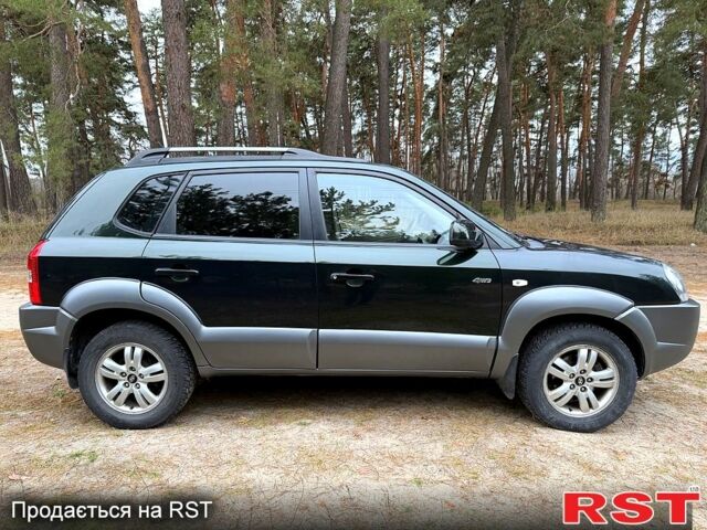 Зеленый Хендай Туксон, объемом двигателя 2 л и пробегом 185 тыс. км за 7950 $, фото 5 на Automoto.ua