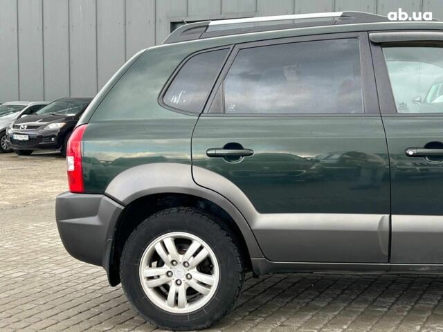 Зеленый Хендай Туксон, объемом двигателя 2 л и пробегом 223 тыс. км за 8540 $, фото 5 на Automoto.ua